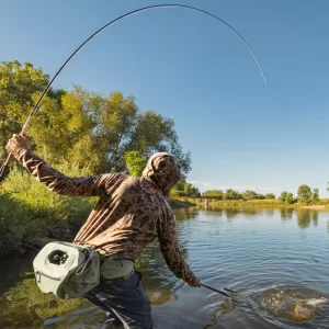Orvis Helios fly rod being used to catch a big trout