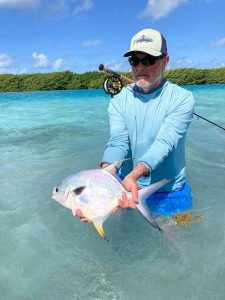 Ambergris Caye Fly Fishing Russ with his first permit